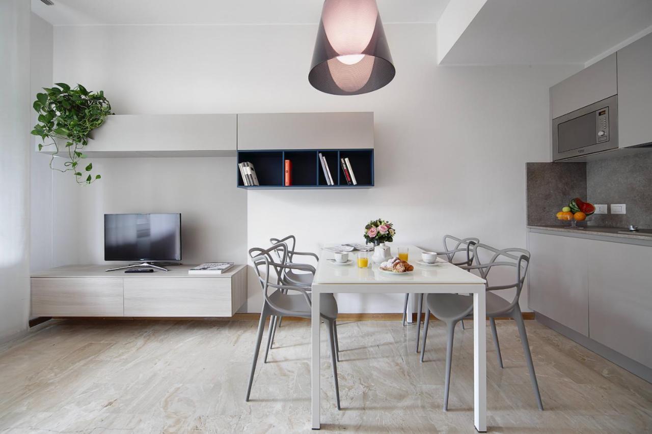 Contempora Apartments - Elvezia 8 - E22 Milan Bagian luar foto